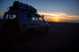 4x4;Adventure;Africa;Cars;Dawn;Deserts;Djibouti;Four-wheel-drive;Kaleidos;Kaleidos-images;Lake-Abbe;Lake-Abhe-Bad;Landscapes;Sun-rise;Sunrise;Tarek-Charara;Tourism;Transport;Transportation;Vehicles