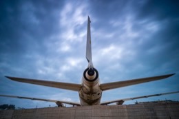 Barakah,-L1011-TriStar,-Lockheed-L1011,-abandoned-TriStar,-aircraft-wreck,-grounded-aircraft,-white-fuselage,-derelict-cockpit,-empty-cabin,-Cotonou-beach,-Cadjéhoun-beach,-Cotonou-Benin,-West-Africa,-Benin-airport,-Atlantic-coastline,-coastal-Benin,-corroded-wreck,-marine-rust,-deterioration,-salt-corrosion,-decay,-abandonment,-dereliction,-dilapidation,-environmental-erosion,-aviation-heritage,-industrial-archaeology,-failed-tourism-project,-open-air-museum,-urban-art,-colonial-relic,-Benin-history,-alternative-tourism,-architectural-curiosity,-aviation-history,-hajj-pilgrimage,-Air-Rum-airline,-defunct-carrier,-humanitarian-transport,-international-migration,-historical-traces,-industrial-heritage,-stranded-aircraft,-tourist-attraction,-urban-exploration,-ruin-photography,-beach-adventure,-Beninese-leisure,-amusement-park,-immersive-experience,-urban-safari,-overcast-sky,-sunset-beach,-tropical-storm,-coastal-erosion,-sea-salt,-Atlantic-Ocean,-white-sand,-coastal-vegetation,-gleaming-white,-nature-machine-contrast,-aerospace-geometry,-outstretched-wings,-empty-windows,-cabin-stairway,-cockpit-instruments,-time-displacement,-obsolescence,-suspended-time,-liminality,-aborted-transformation,-urban-memory,-unfinished-dream,-nature-industry-symbiosis,-tourism-ghost,-frozen-history