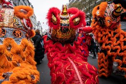 19th-arrondissement;-Belleville;-Chinese-culture;-Chinese-New-Year;-Dancers;-Evil-spirits;-France;-Fringes;-Good-luck-charm;-Kaleidos;-Kaleidos-images;-La-parole-à-limage;-Lion-dance;-Lions;-Lunar-New-Year;-Medallions;-Orange-lions;-Parade;-Paris;-Red-lion;-Rue-de-Belleville;-Sequins;-Spectators;-Stories-Pictures;-Tarek-Charara;-Traditional-costumes;-Traditional-festival;-Trees;-Water-Rabbit;-Year-of-the-Rabbit