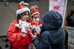 19th-arrondissement;-Belleville;-Chinese-culture;-Chinese-New-Year;-France;-Headdresses;-Kaleidos;-Kaleidos-images;-La-parole-à-limage;-Leaflets;-Lunar-New-Year;-Parade;-Paris;-Pop-up-stand;-Rue-de-Belleville;-Smartphones;-Stories-Pictures;-Tarek-Charara;-Traditional-costumes;-Traditional-festival;-Visitors;-Water-Rabbit;-Year-of-the-Rabbit;-Young-women