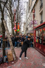 13th-arrondissement;-Chinatown;-Chinese-culture;-Chinese-New-Year;-Demons;-Firecrackers;-France;-Happiness;-Kaleidos;-Kaleidos-images;-La-parole-à-limage;-Ladder;-Lanterns;-Lighting;-Lunar-New-Year;-Man;-New-Year-firecrackers;-Paris;-Peace;-Red-paper;-Scooter;-Smoke;-Spectators;-Stories-Pictures;-String-of-firecrackers;-Tarek-Charara;-Tradition;-Traditional-festival;-Tree;-Water-Rabbit;-Year-of-the-Rabbit