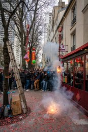 13th-arrondissement;-Chinatown;-Chinese-culture;-Chinese-New-Year;-Crowd;-Demons;-Explosion;-Firecrackers;-France;-Happiness;-Kaleidos;-Kaleidos-images;-La-parole-à-limage;-Ladder;-Lanterns;-Lunar-New-Year;-New-Year-firecrackers;-Paris;-Peace;-Red-paper;-Smoke;-Sparks;-Spectators;-Stories-Pictures;-String-of-firecrackers;-Tarek-Charara;-Tradition;-Traditional-festival;-Tree;-Water-Rabbit;-Year-of-the-Rabbit